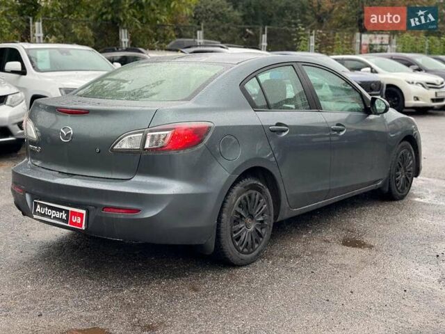 Синий Мазда 3, объемом двигателя 2 л и пробегом 245 тыс. км за 8740 $, фото 5 на Automoto.ua