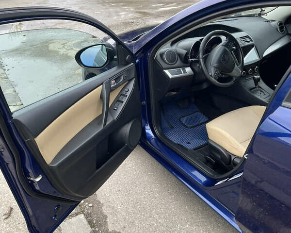 Синий Мазда 3, объемом двигателя 2 л и пробегом 212 тыс. км за 7500 $, фото 6 на Automoto.ua