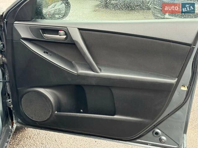 Синий Мазда 3, объемом двигателя 2 л и пробегом 245 тыс. км за 8740 $, фото 21 на Automoto.ua