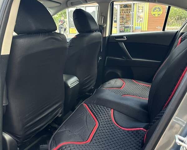 Синий Мазда 3, объемом двигателя 2 л и пробегом 155 тыс. км за 8000 $, фото 9 на Automoto.ua