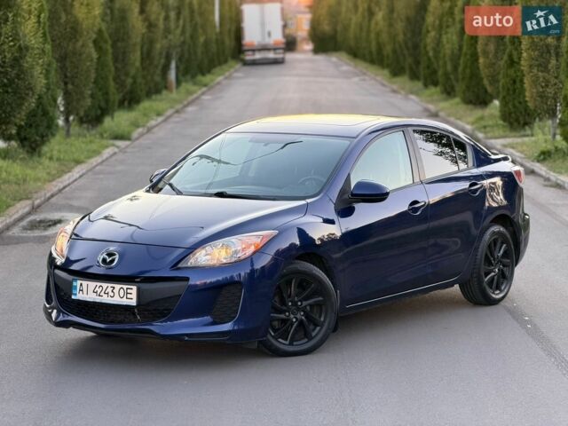 Синий Мазда 3, объемом двигателя 2 л и пробегом 248 тыс. км за 6990 $, фото 1 на Automoto.ua