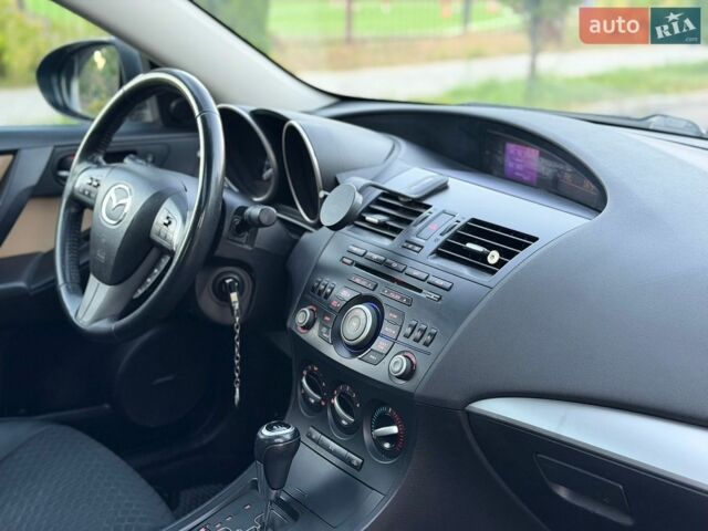 Синий Мазда 3, объемом двигателя 2 л и пробегом 248 тыс. км за 6990 $, фото 50 на Automoto.ua