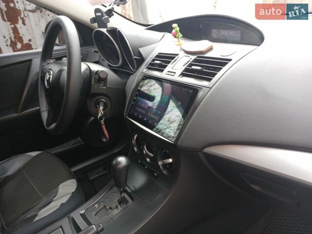 Синій Мазда 3, об'ємом двигуна 2 л та пробігом 155 тис. км за 7800 $, фото 31 на Automoto.ua