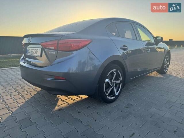 Синий Мазда 3, объемом двигателя 2 л и пробегом 150 тыс. км за 9500 $, фото 2 на Automoto.ua