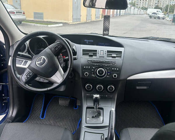 Синий Мазда 3, объемом двигателя 2 л и пробегом 190 тыс. км за 9000 $, фото 13 на Automoto.ua