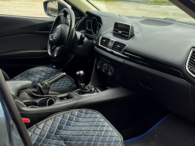 Синій Мазда 3, об'ємом двигуна 2 л та пробігом 211 тис. км за 9500 $, фото 5 на Automoto.ua