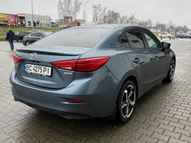 Синий Мазда 3, объемом двигателя 2 л и пробегом 149 тыс. км за 9499 $, фото 2 на Automoto.ua