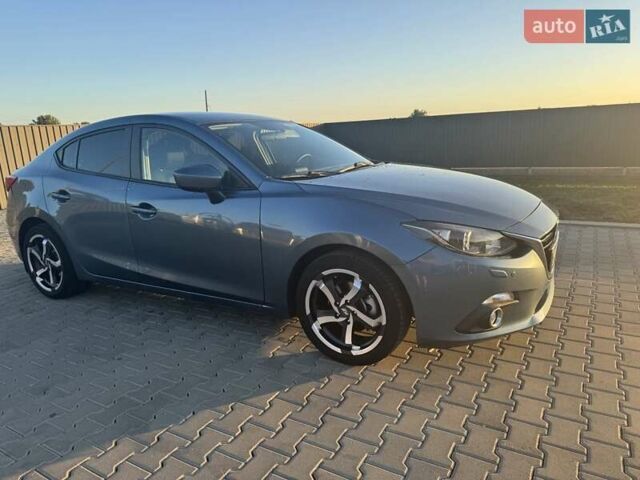 Синий Мазда 3, объемом двигателя 2 л и пробегом 150 тыс. км за 9500 $, фото 4 на Automoto.ua