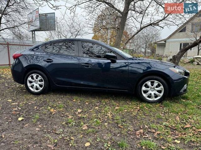 Синий Мазда 3, объемом двигателя 2 л и пробегом 226 тыс. км за 9500 $, фото 2 на Automoto.ua