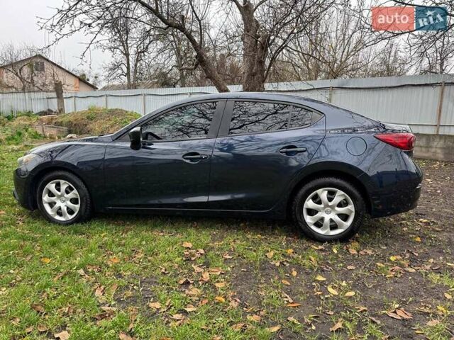 Синий Мазда 3, объемом двигателя 2 л и пробегом 226 тыс. км за 9500 $, фото 3 на Automoto.ua