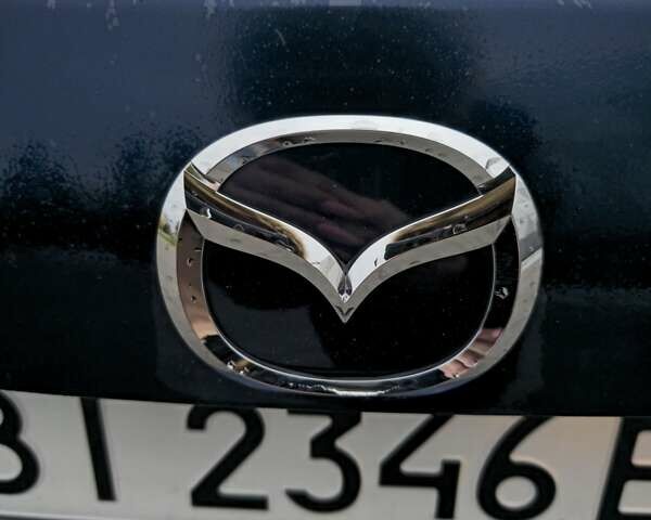 Синий Мазда 3, объемом двигателя 2 л и пробегом 166 тыс. км за 10500 $, фото 3 на Automoto.ua