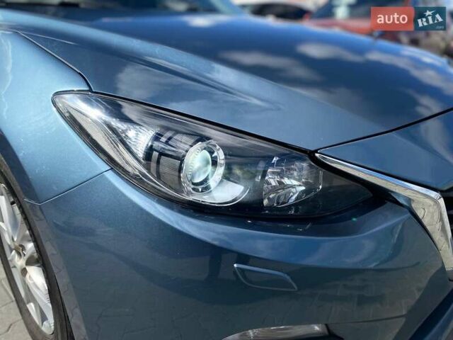 Синий Мазда 3, объемом двигателя 1.5 л и пробегом 222 тыс. км за 10990 $, фото 4 на Automoto.ua