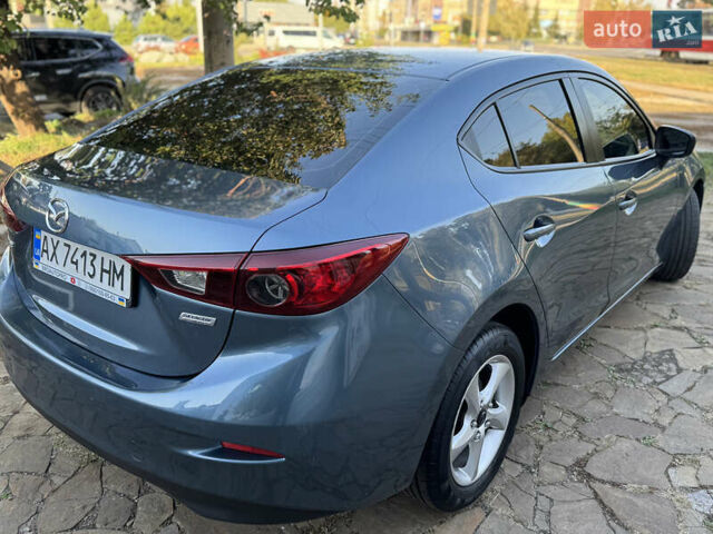 Синий Мазда 3, объемом двигателя 2 л и пробегом 136 тыс. км за 8999 $, фото 16 на Automoto.ua