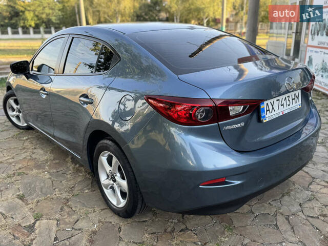 Синий Мазда 3, объемом двигателя 2 л и пробегом 136 тыс. км за 8999 $, фото 5 на Automoto.ua
