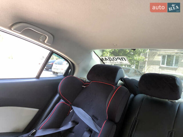 Синий Мазда 3, объемом двигателя 2 л и пробегом 207 тыс. км за 10250 $, фото 22 на Automoto.ua