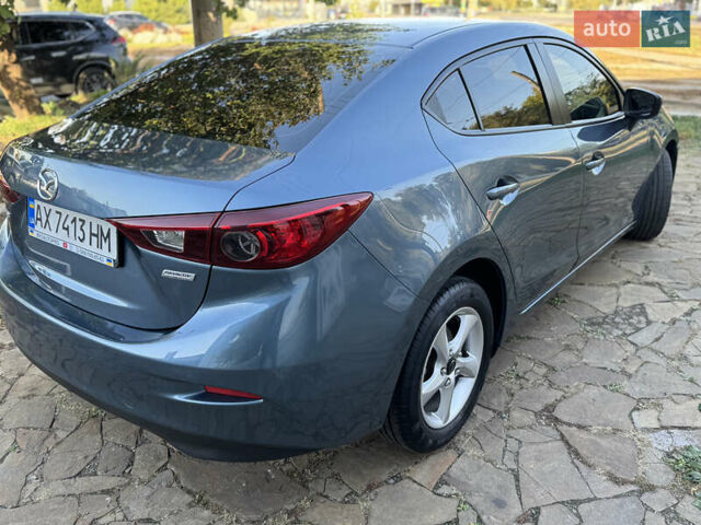 Синій Мазда 3, об'ємом двигуна 2 л та пробігом 136 тис. км за 8800 $, фото 2 на Automoto.ua