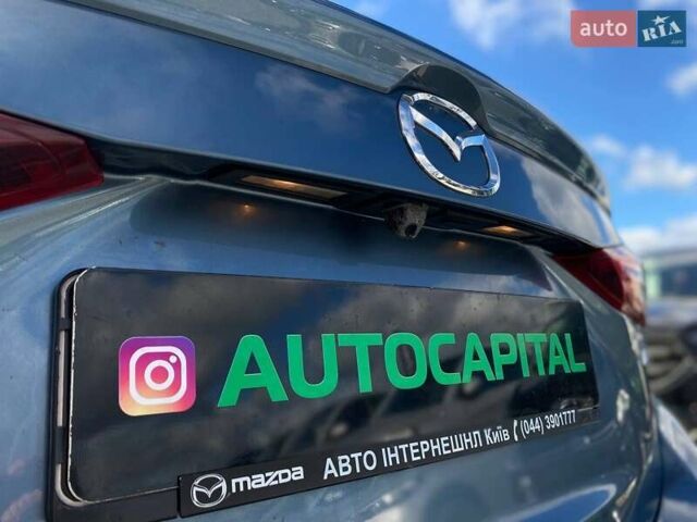 Синий Мазда 3, объемом двигателя 1.5 л и пробегом 222 тыс. км за 10990 $, фото 12 на Automoto.ua