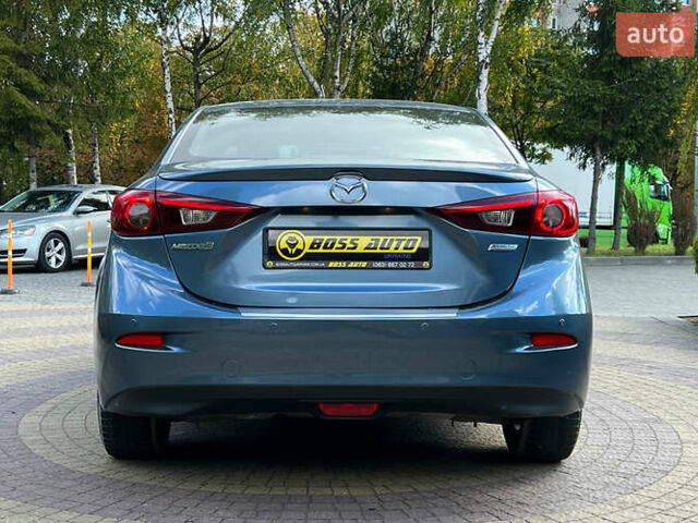 Синий Мазда 3, объемом двигателя 1.5 л и пробегом 135 тыс. км за 9850 $, фото 5 на Automoto.ua