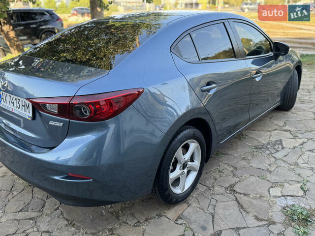Синій Мазда 3, об'ємом двигуна 2 л та пробігом 136 тис. км за 8800 $, фото 3 на Automoto.ua