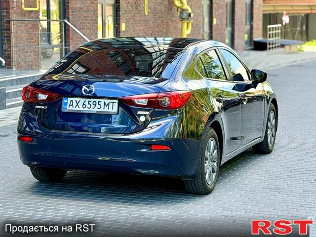 Синій Мазда 3, об'ємом двигуна 2 л та пробігом 157 тис. км за 8800 $, фото 5 на Automoto.ua