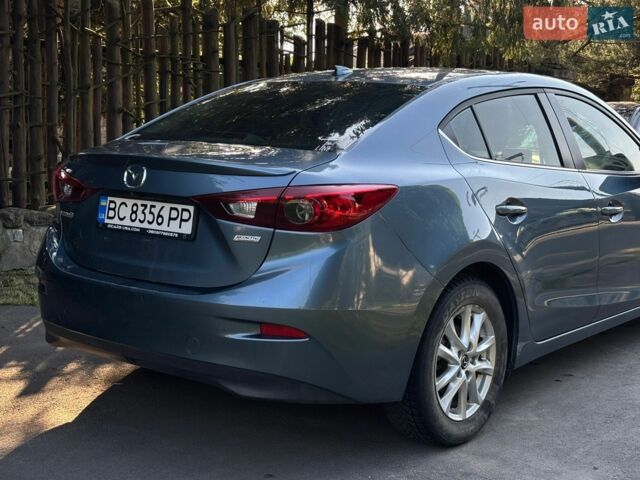 Синий Мазда 3, объемом двигателя 2 л и пробегом 324 тыс. км за 8000 $, фото 7 на Automoto.ua
