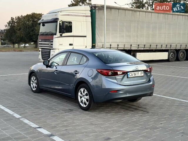 Синий Мазда 3, объемом двигателя 2 л и пробегом 147 тыс. км за 10700 $, фото 2 на Automoto.ua