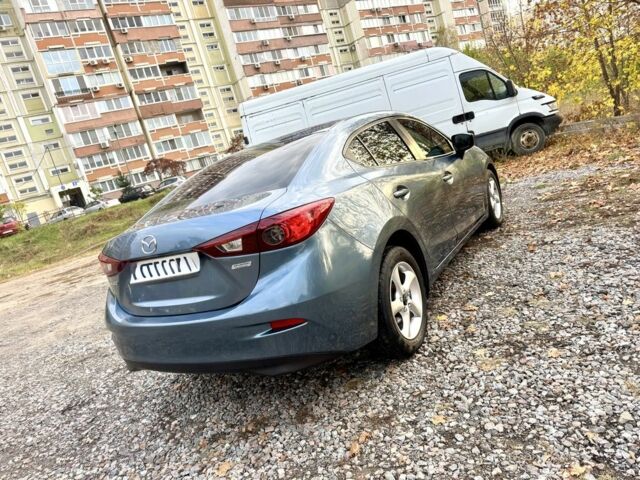 Синий Мазда 3, объемом двигателя 2 л и пробегом 137 тыс. км за 10590 $, фото 5 на Automoto.ua