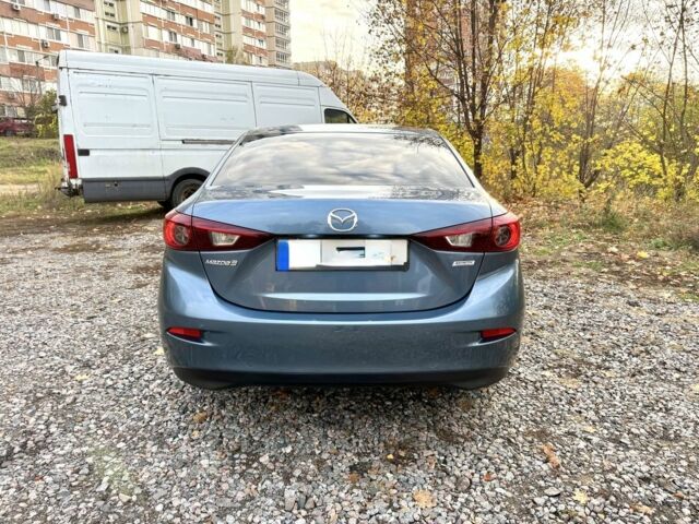 Синий Мазда 3, объемом двигателя 2 л и пробегом 137 тыс. км за 10590 $, фото 4 на Automoto.ua