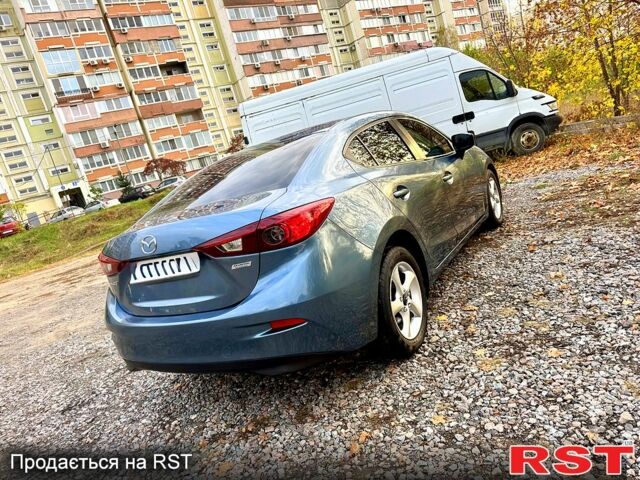 Синий Мазда 3, объемом двигателя 2 л и пробегом 137 тыс. км за 10590 $, фото 5 на Automoto.ua