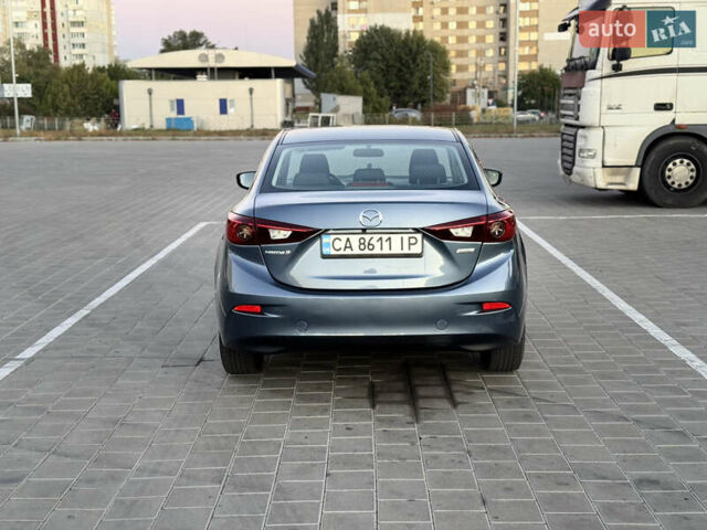 Синий Мазда 3, объемом двигателя 2 л и пробегом 147 тыс. км за 10700 $, фото 5 на Automoto.ua