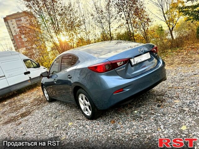 Синий Мазда 3, объемом двигателя 2 л и пробегом 137 тыс. км за 10590 $, фото 3 на Automoto.ua