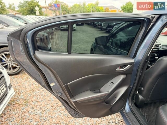 Синій Мазда 3, об'ємом двигуна 2 л та пробігом 65 тис. км за 12600 $, фото 14 на Automoto.ua