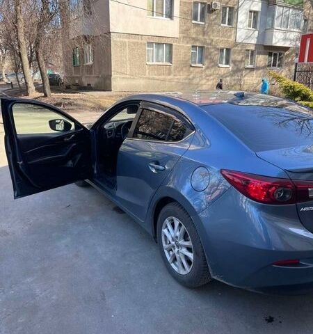 Синій Мазда 3, об'ємом двигуна 2 л та пробігом 61 тис. км за 13000 $, фото 7 на Automoto.ua