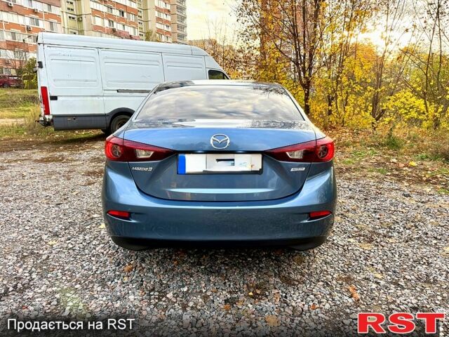 Синий Мазда 3, объемом двигателя 2 л и пробегом 137 тыс. км за 10590 $, фото 4 на Automoto.ua