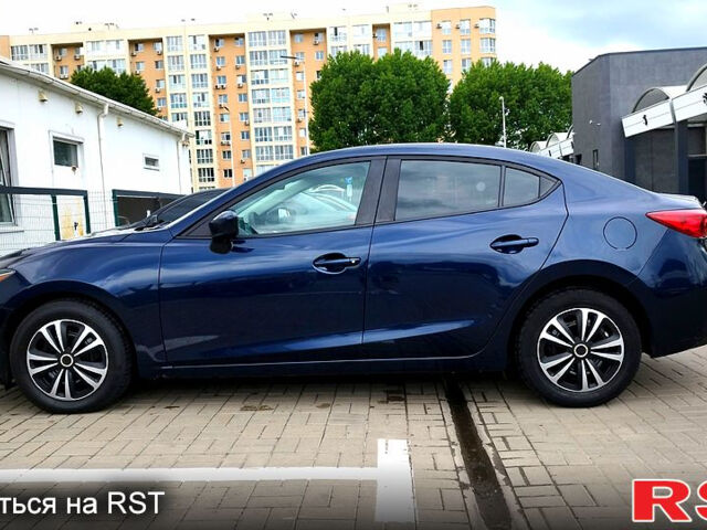 Синий Мазда 3, объемом двигателя 2 л и пробегом 147 тыс. км за 9500 $, фото 4 на Automoto.ua