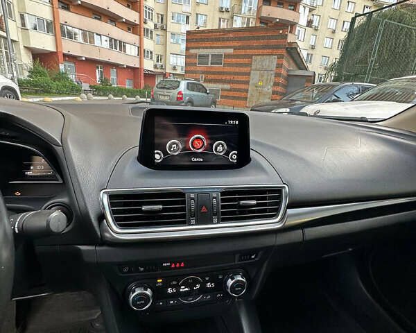 Синий Мазда 3, объемом двигателя 1.5 л и пробегом 128 тыс. км за 15200 $, фото 16 на Automoto.ua