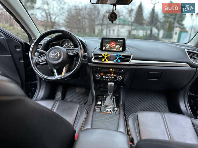 Синий Мазда 3, объемом двигателя 2 л и пробегом 117 тыс. км за 13400 $, фото 18 на Automoto.ua