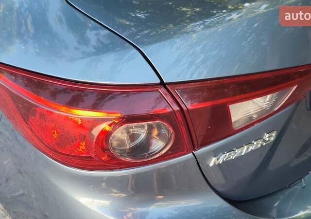 Синий Мазда 3, объемом двигателя 2 л и пробегом 183 тыс. км за 11000 $, фото 14 на Automoto.ua