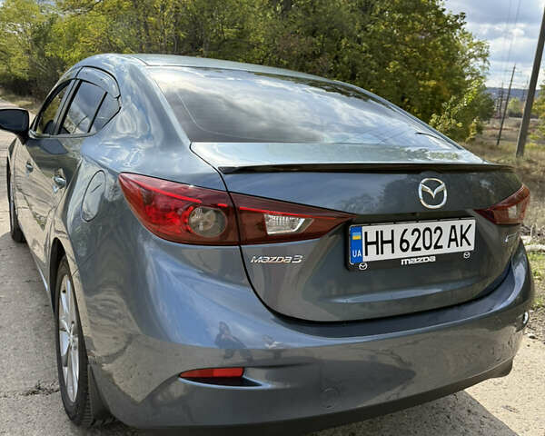 Синий Мазда 3, объемом двигателя 2 л и пробегом 126 тыс. км за 11200 $, фото 8 на Automoto.ua