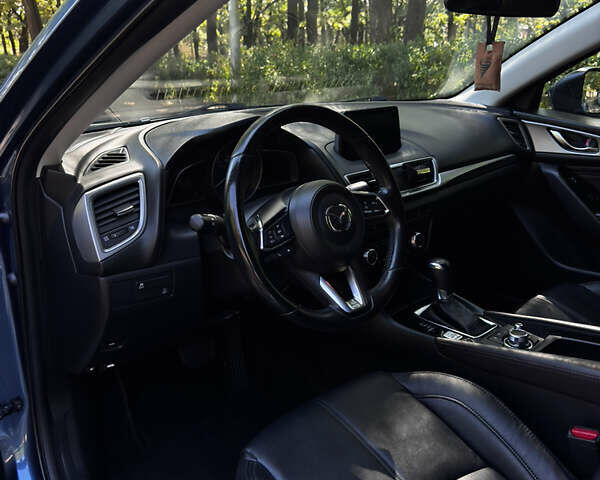 Синий Мазда 3, объемом двигателя 2 л и пробегом 102 тыс. км за 13900 $, фото 14 на Automoto.ua