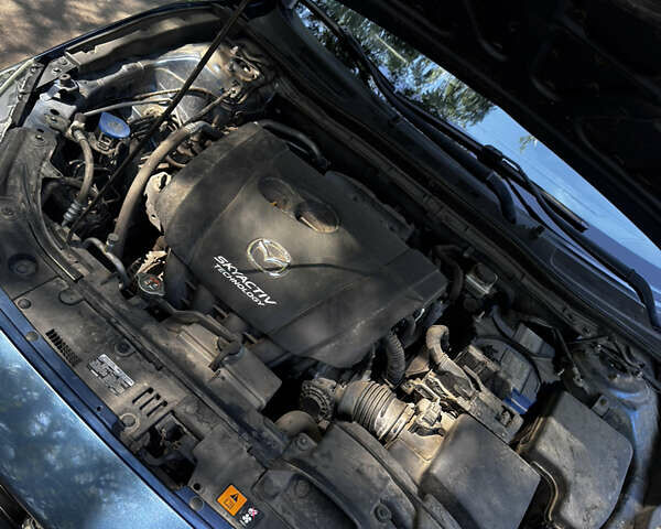 Синий Мазда 3, объемом двигателя 2 л и пробегом 102 тыс. км за 13900 $, фото 22 на Automoto.ua