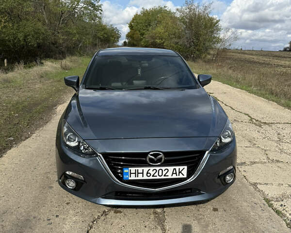 Синий Мазда 3, объемом двигателя 2 л и пробегом 126 тыс. км за 11200 $, фото 2 на Automoto.ua