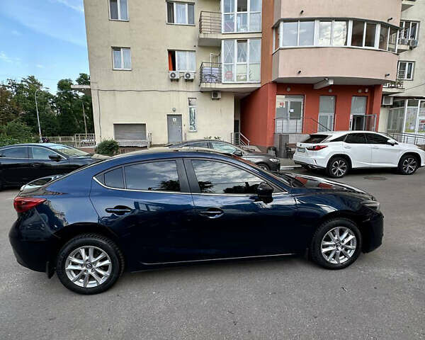 Синий Мазда 3, объемом двигателя 1.5 л и пробегом 128 тыс. км за 15200 $, фото 5 на Automoto.ua