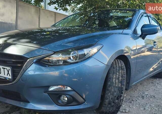 Синий Мазда 3, объемом двигателя 2 л и пробегом 183 тыс. км за 11000 $, фото 7 на Automoto.ua