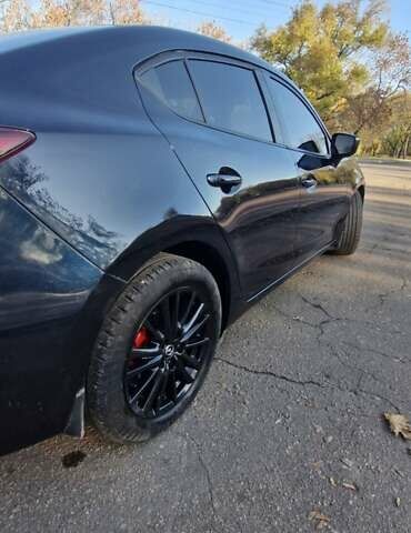 Синий Мазда 3, объемом двигателя 2 л и пробегом 165 тыс. км за 12500 $, фото 10 на Automoto.ua