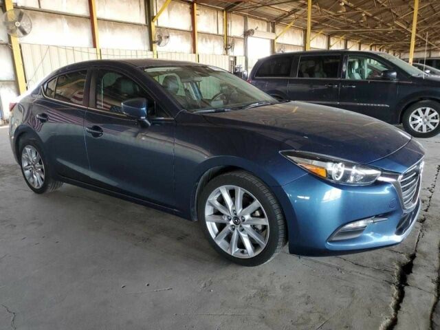 Синий Мазда 3, объемом двигателя 2 л и пробегом 162 тыс. км за 2700 $, фото 3 на Automoto.ua
