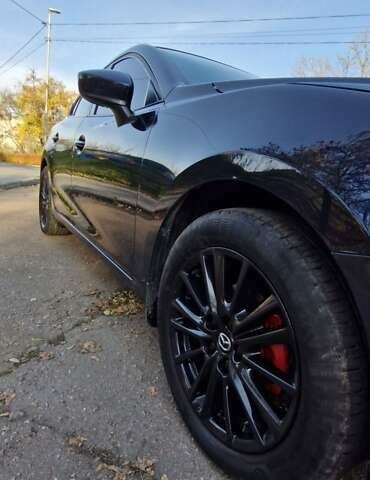 Синий Мазда 3, объемом двигателя 2 л и пробегом 165 тыс. км за 12500 $, фото 2 на Automoto.ua