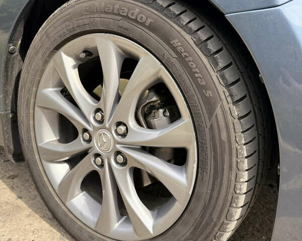 Синий Мазда 3, объемом двигателя 2 л и пробегом 126 тыс. км за 11200 $, фото 24 на Automoto.ua