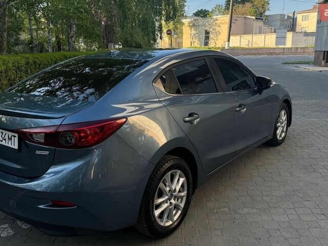 Синий Мазда 3, объемом двигателя 2 л и пробегом 178 тыс. км за 11000 $, фото 22 на Automoto.ua