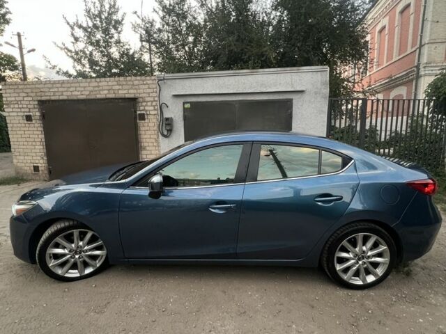 Синий Мазда 3, объемом двигателя 2 л и пробегом 157 тыс. км за 13315 $, фото 2 на Automoto.ua